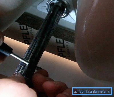 With the help of studs and nuts the mixer is fixed in place. With the help of studs and nuts the mixer is fixed in place.