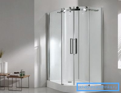 Acrylic corner shower 100x100 with a low basement in a minimalist interior