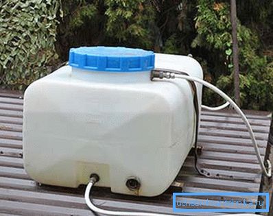 Tank on the roof of the summer shower. Tank on the roof of the summer shower.
