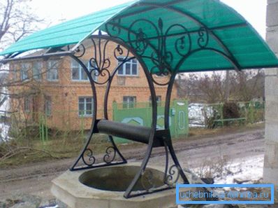 Concrete well with polycarbonate roofing and forging. Concrete well with polycarbonate roofing and forging.
