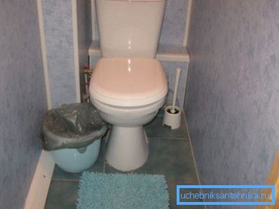 Budget toilet repair. The risers are hidden by plastic panels. Budget toilet repair. The risers are hidden by plastic panels.