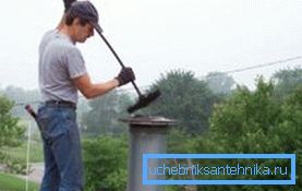 Cleaning a clog with a brush