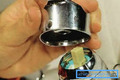 Demonstrating the process of removing the lever.
