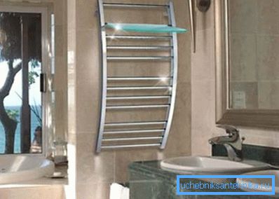 Towel holders differ in shape and size, as well as the possibility of installing shelves for bathroom accessories