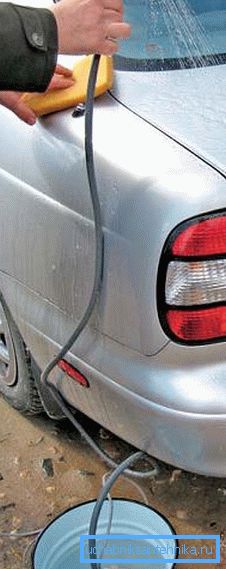 The shower can be used to wash the car. The shower can be used to wash the car.