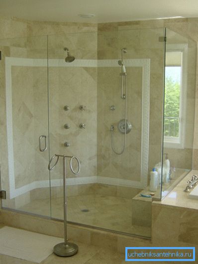 Shower area with glass walls Shower area with glass walls