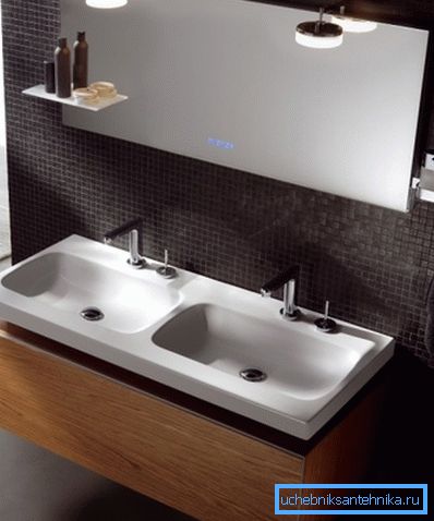 Double washbasin - a great choice for a large family. Double washbasin - a great choice for a large family.