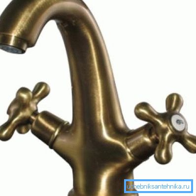 Two valve tap on the sink. Two valve tap on the sink.