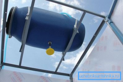 Water tank from household barrels. Water tank from household barrels.