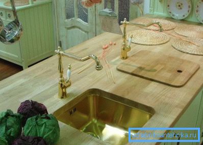 Photo of a wooden table under the sink. Photo of a wooden table under the sink.