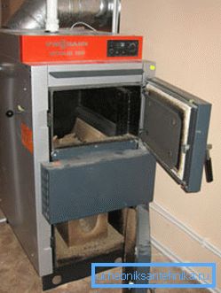 Photo of a modern solid fuel stove Photo of a modern solid fuel stove