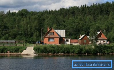 Photo of a country cottage by the river