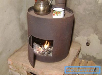 Garage stove on the wood from the pipe with their own hands Garage stove on the wood from the pipe with their own hands