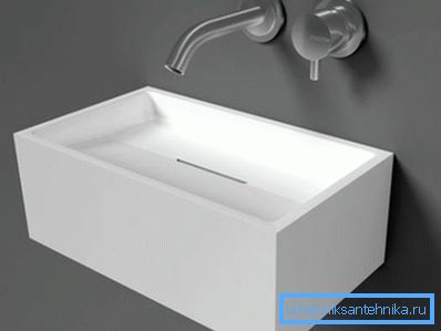 Interesting sink design in a small bathroom Interesting sink design in a small bathroom
