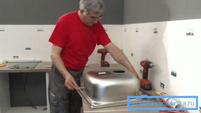 High-quality installation of washing in the kitchen with their own hands High-quality installation of washing in the kitchen with their own hands