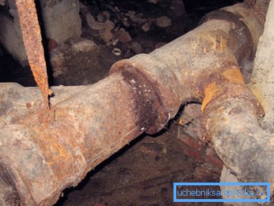 Old type sewage system of cast iron shaped elements.