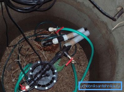 Caisson with wellhead and water pipes Caisson with wellhead and water pipes