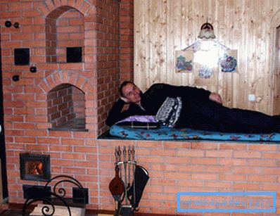 Brick stove with a stove bench Brick stove with a stove bench