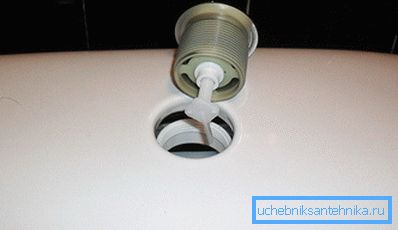 The button is removed carefully so as not to damage or drop it. The button is removed carefully so as not to damage or drop it.