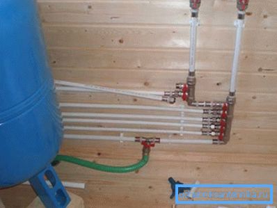 The collector scheme of water supply in a private house with their own hands during the assembly process. The collector scheme of water supply in a private house with their own hands during the assembly process.