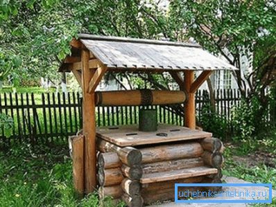 Well in a rustic style. Well in a rustic style.