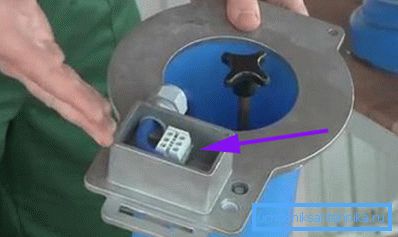 Box with terminal block (indicated by arrow) on top Box with terminal block (indicated by arrow) on top