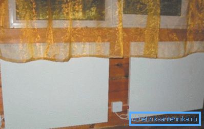 Amateur photo, electric heaters, made in the form of panels with ceramic inserts Amateur photo, electric heaters, made in the form of panels with ceramic inserts