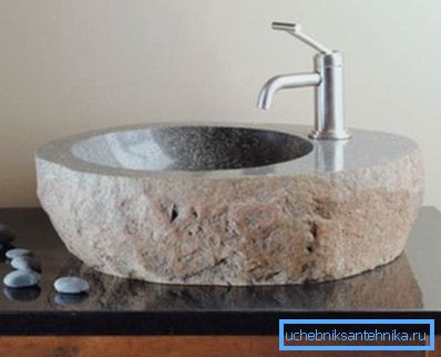 Monolithic bowl made of natural stone. Monolithic bowl made of natural stone.