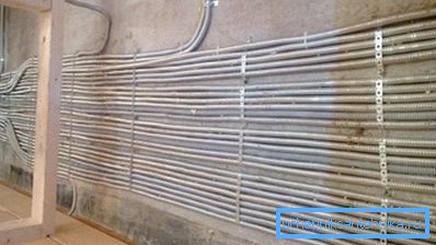 Installation of corrugated pipes on the walls of the building Installation of corrugated pipes on the walls of the building