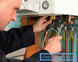 Installation of a heating boiler on gas. A photo Installation of a heating boiler on gas. A photo