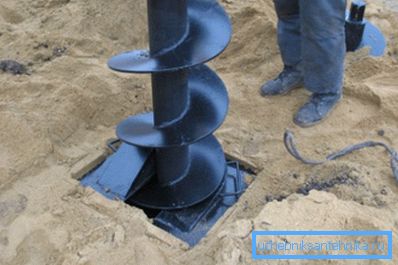 In the photo - well development by auger drill In the photo - well development by auger drill