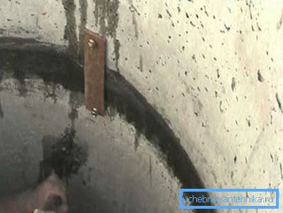 In the photo - a bracket for fastening concrete sections In the photo - a bracket for fastening concrete sections