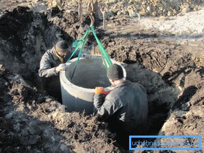 In the photo - the construction of a concrete well-damper In the photo - the construction of a concrete well-damper