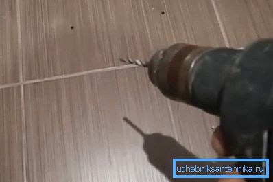 In the photo - neat holes in the tile