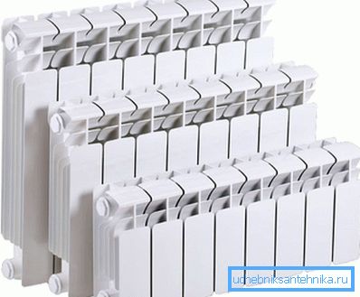 In the photo - bimetallic radiators of three main sizes.