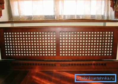 In the photo - a wooden protective screen In the photo - a wooden protective screen