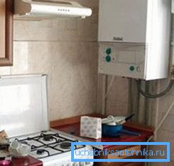 In the photo - a dual-circuit modern gas boiler for autonomous apartment heating In the photo - a dual-circuit modern gas boiler for autonomous apartment heating