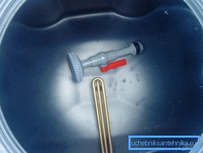 In the photo - a container with a heating element. In the photo - a container with a heating element.
