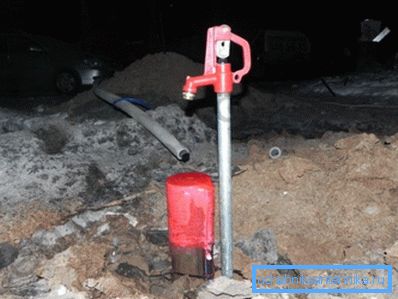 On the photo is a hydrant on the plot On the photo is a hydrant on the plot