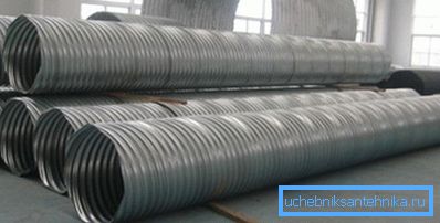 On the photo - corrugated steel pipes On the photo - corrugated steel pipes