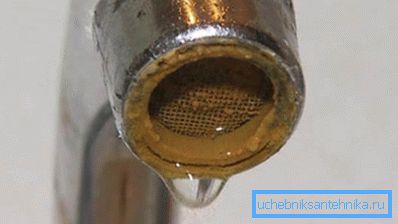 The photo shows a characteristic yellow precipitate of iron oxides. The photo shows a characteristic yellow precipitate of iron oxides.