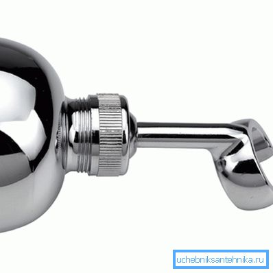 The photo clearly shows how the watering can holder and wall unit are connected.