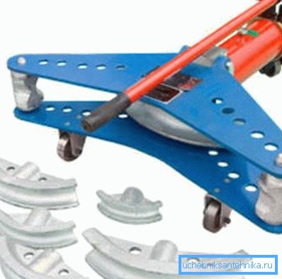The photo shows a segmented pipe bender. The photo shows a segmented pipe bender.