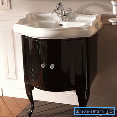 In the photo - an elegant cabinet for the sink. In the photo - an elegant cabinet for the sink.