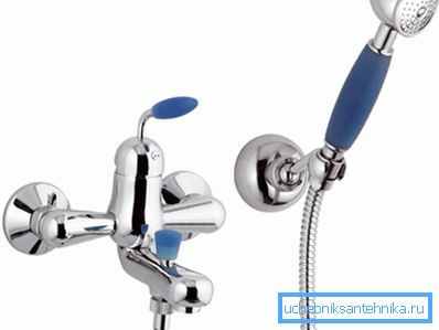 In the photo: the faucet in the bathroom with a shower has a more complex device. Indeed, in the construction there is a separate unit in the form of a watering can, the water supply to which is carried out as needed. In the photo: the faucet in the bathroom with a shower has a more complex device. Indeed, in the construction there is a separate unit in the form of a watering can, the water supply to which is carried out as needed.