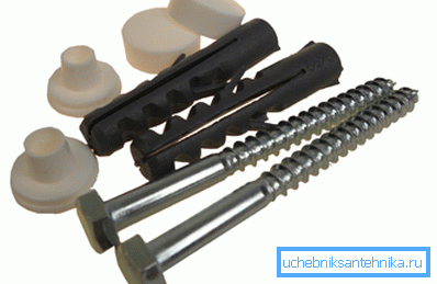 On the photo - fixing accessories for the installation of a toilet bowl On the photo - fixing accessories for the installation of a toilet bowl