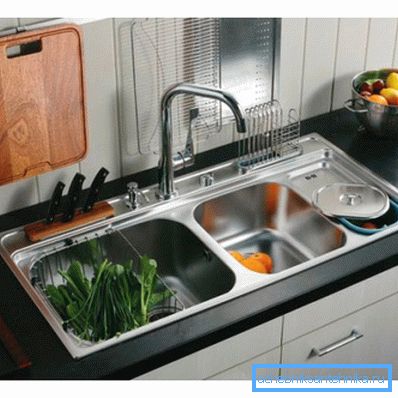 On the photo - kitchen sink functionality with two bowls. On the photo - kitchen sink functionality with two bowls.