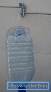 In the photo: many make a shower from the bottle to the country with their own hands in this way - they simply hang the container on the wall and, if necessary, open the lid In the photo: many make a shower from the bottle to the country with their own hands in this way - they simply hang the container on the wall and, if necessary, open the lid