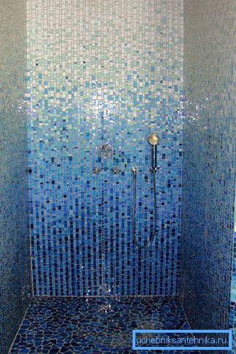 In the photo: a mosaic in the shower allows you to make this small compartment original and attractive. In the photo: a mosaic in the shower allows you to make this small compartment original and attractive.