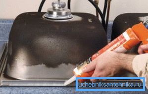 In the photo - applying sealant on board the bowl In the photo - applying sealant on board the bowl